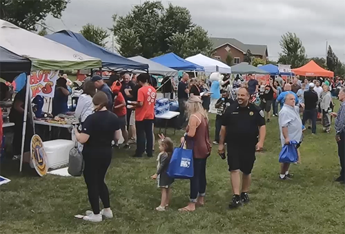 Big Crowd Braves Big Wind During Another Successful National Night Out